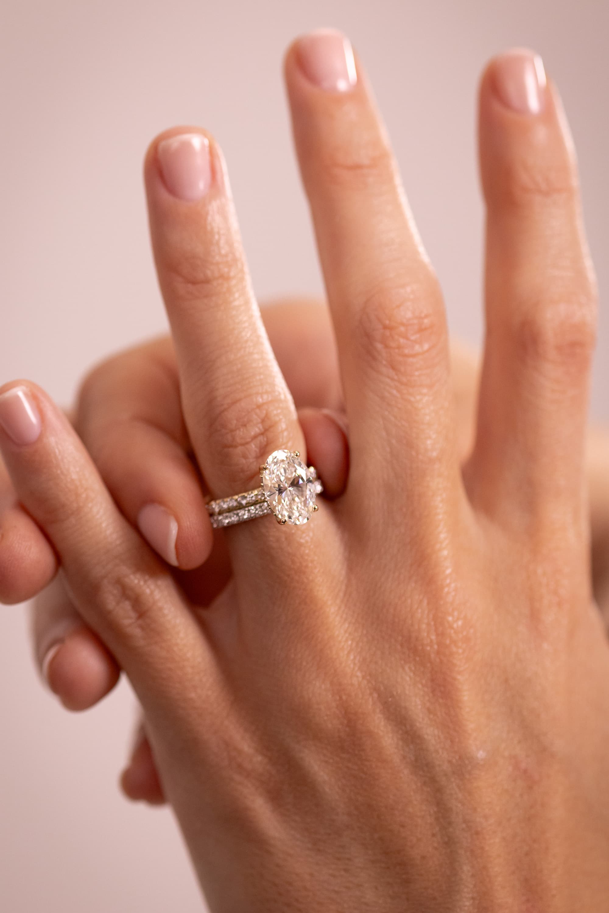 A classic yellow gold solitaire engagement ring with a round brilliant diamond
