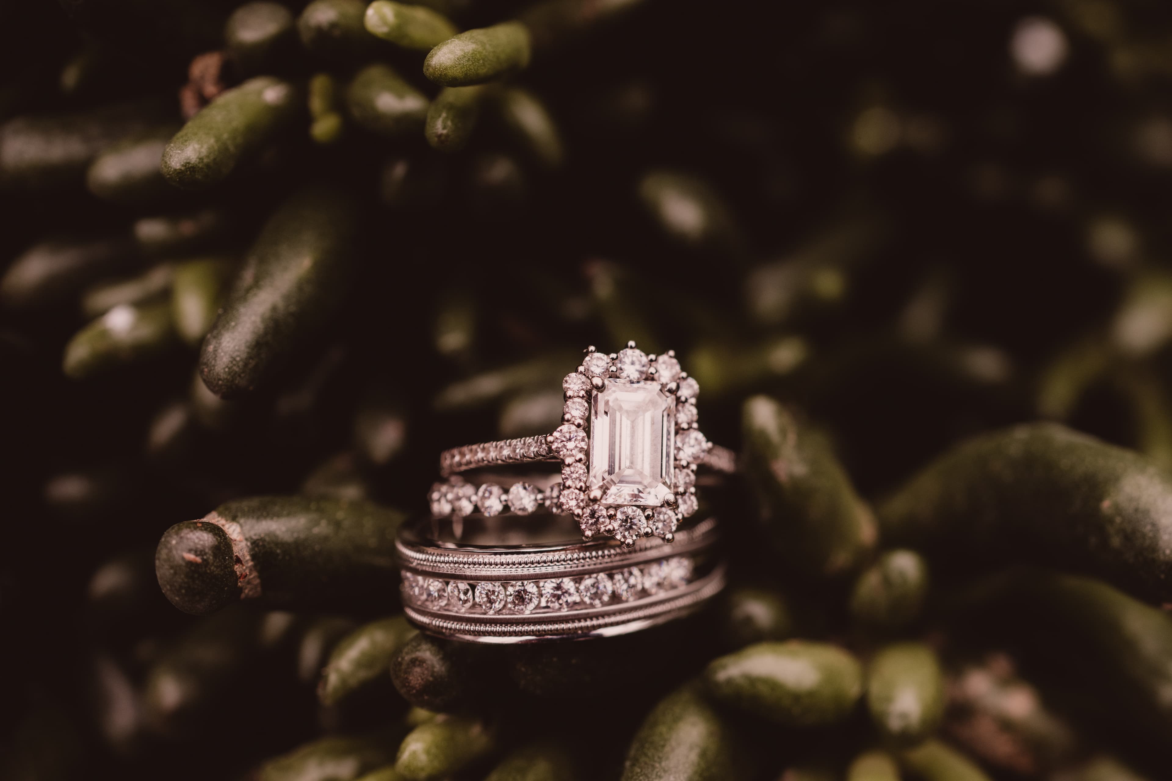 An ornate antique yellow gold ring beside its modern reset as a clean yellow gold solitaire